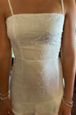 SUPER cute dress that fit like a glove when my daughter tried it on late one evening after it was delivered. It hung in her closet until her graduation day, and we were headed to church for mass. The zipper is off center and crooked, the straps are uneven and dug into her armpits, but it's literally all she had to wear for her mass and ceremony. I'm hoping for a return or at least a partial refund for this. It's NOT a $56 quality dress, and it wasn't a "quick fix" to make it look right. - Lisa Z.
