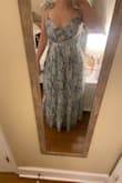 I really liked the dress but the sizing wasn't right for me. The waist was the perfect size (a medium would have been too tight), but the cups were too big. I didn't love it enough to pay to get it altered. - Maris B.