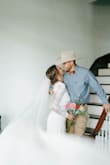 I did get this hemmed a bit but wore it for a big wedding and it photographed beautifully! - Aubrey H.