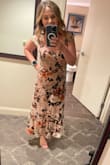 Really liked this dress. I am 5'3 with a 32B bust and ordered a size small and fit perfectly. However, I didn't notice the dress was damaged until I had already taken the tags off and put it on. So now I can't return or exchange it because Lulus doesn't let you unless you have the tag. Love the dress, but it arrived damaged. - Molly V.