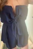 Based of Lulus sizing, I ordered a small but could barely zip up the back. I wanted to exchange for a medium, but that wasn't available at the time, so I tried the large. I'm not sure I'd have been able to zip up the medium either! I do have a larger bust, so if a smaller bust you could probably use a smaller size. I was worried the large would be too much material, but it still looks really cute on! Could dress it up or down. - Natasha T.
