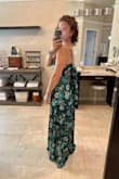 This dress is beautiful and looks like exactly like the online photos. It fit well, was super comfortable, and the material was nice and light. All that said, there was nothing that really made this dress stand out, so I ended up picking a different dress to wear to the wedding I attended. - Elizabeth