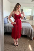 Cute dress with ruffles, bow straps, and a flattering neckline. The zipper is a little difficult to use; however, for the sale price, I was happy with this dress for my sister's "garden party" summer wedding! - Cheyanna J.