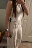 I love the material, and this top is so high quality. It's definitely shorter than I would like, but it's so cute that I'm keeping it. I'm also not going larger because I think it would just make it look boxy. I love that this can be worn with jeans, float pants, or a cute skirt! - Regina R.