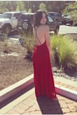 I bought this dress about a year or so ago in red and I fell in love as soon as I pulled it out of the box and slid it on; the fit was perfect and it made me look like a princess. The boobage was classy, the back cut was gorgeous and I got a ton of compliments. I loved it so much that I decided to order it in another color. I got it today and immediately could feel a difference in the material, it was lighter and cheaper material. They also added elastic strips on the edges of the top that made it uncomfortable and sit awkwardly on my chest. This dress was lacking the heaviness of my older dress and that made it not hang properly on the waist. Even after adjusting the straps it didn't compare to my other dress. I'm very sad that I couldn't love this dress. I'll be sending it back with a lot of disappointment in Lulu's for changing perfection and will not have a dress for formal this year, unfortunately. I will be including pictures of the red dress that I loved before they changed it. - Taylor B.