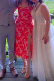 OMG! I absolutely love this dress. It was perfect for a summer wedding!! I have a really small chest, but the upper part of the dress was tight enough that I didn't have to worry about it at all. - Zeynep S.