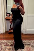 True black dress. No adjustments needed for length at 5'5 and zipper was sturdy. Be aware the boning in the top is plastic in the body of the corset style dress. Thick enough not to show cellulite. - Elyssa G.