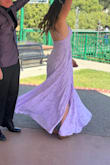 I have purchased from lulu before and I have always fit the x-small.  This was no different.  The back straps adjust and with cakes, the girls stayed in place.  I love the lavender color, the floral pattern, the way the dress ruffled.  It was the perfect amount of pretty, modest and glamorous. - Greta P.