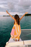Purchased this dress for my honeymoon in Bora Bora. Absolutely loved it! I was able to dress it up with cute shoes for an evening out, and I wore it as a cover-up. Super comfortable and flowy. I have a small chest (34A) and was able to wear this dress with no bra. - Katie G.