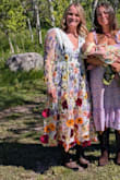 I love this dress. I wore it for my wedding. So unique and colorful. Lots of compliments! Great price point. I ordered both a L and XL and decided to stick with the XL to allow more movement/cleavage control in the bust (I could have worn the L without a bra/stickies). Fabric not stretchy but not uncomfortable either. So fun <3 - Hannah F.