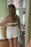 I purchased this for my wedding day getting ready fit. I followed the size chart based on my body measurements. I think the dress is good quality and fits well in the boobs. Where the back strap connects to the skirt portion is a little loose. The skirt portion is the problem for me because...I have a bit of a bigger booty... so the skirt rides up in the back. Its quite significant, I can feel a breeze back there. There is luckily a matching robe that is an appropriate length that I can use to cover up with, but if you have a thick booty, consider another slip. An XL would be too big in the tummy and boobs if you're someone close to my size unless you get parts taken in. - Meghan G.