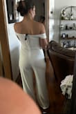 Good thick, quality material we know and love! You will have to wear nude undergarments and canNOT raise your hands above the elbow- so, be aware of that. Very beautiful piece - Deme R.
