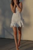 ok listen, the front did not look good on MY chest, so I sewed a line of ruching for a little sweet heart neck line - this dress was so freakin cute for my graduation and no one had a dress like mine ;) - Gina P.