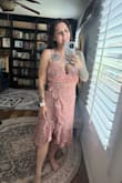 I loved this set, had it on my wishlist for SO long. The skirt is beautiful and flowy, although none of the reviews mentioned that it's a wrap skirt that ties together, and I found the ties to be a bit weird to figure out. I always had one side way longer than the other. But the main issue is that the top fits so badly. The other reviews that said it was designed by someone that had never seen boobs before is correct! In the pictures below I had on nipple covers only and the cut of the top literally shapes your boob into a point, or the seam cuts it in half. See my photo below for the side view, it looks like a triangle with the point just empty air. I just could not make it look normal. Had to return. - Erin R.