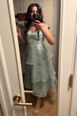 I was torn about sizing, as a 36" bust (M) but a 30" waist (L) with 40" waist (in between M and L) I was so stressed about the sizing. I ended up getting both and tried on the M first. It fit perfectly. I didnt even try the L. Even after a long night of eating and drinking, I was still comfortable in the dress. I totally recommend it and received so many compliments! - Gladys O.