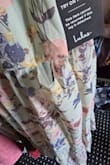 This dress arrived damaged. I have it in blue and purple, and I bought this color that I thought was beautiful but it arrived damaged. I returned it and I'm waiting for my refund because there were no more in my size. I am so disappointed in this dress - Elvia V.