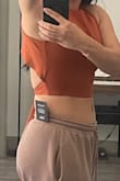 This fits perfectly around chest and shoulder, it's nicely fitted. The issue? Well I need to return because just like a few other buyers it flares out on the sides; there is no way to get the material to lay flat on the back no matter how much you tighten or pull down. I wish this wasn't a problem or I will definitely keep it but I'll be returning - Katherine D.