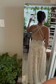 This is such a cute dress. It's not the one, BUT if I were having a beach wedding, it just may have been!! The recommended size for me was a small, but it didn't fit my waist. That's why I put that it's true to size so review my measurements. I do carry more weight in my midsection and back. Also, I'm really short so of course it's super long. It really is great quality! - Rebecca M.