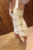 Received so many compliments on this dress! It was a little tight, but I wouldn't have sized up because I liked the tighter fit. If you like it a little loose, I'd size up. Such a cute, versatile dress. Can't wait to wear it again - Emily G.
