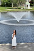 Wore this to my courthouse wedding and it was absolutely gorgeous.. The top seemed a little loose because my chest is small (I got a size M), but I think if I had sized down, it would've been too tight. - Ana C.