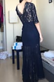 I fell in love with this dress the first time I saw it online but sadly it was out of stock! Patiently waited for it to come back and ordered it the instant it did. It's so elegant and hugs your curves perfectly. It was a little long so I paid to get it altered, which wasn't cheap due to the lace hem but so worth it! I wore it to a graduation dinner. It would be perfect for a fall/winter wedding or any formal event. - Wendan L.