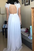 Ordered this dress as a potential wedding dress but it was a little too casual for me. Also the waist was too small on this dress when I'm a perfect XS in all other Lulu's dresses, but I could not zip this one up all the way (see photo). The skirt falls very nicely though and overall it's a very pretty dress. - Wendan L.