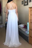 Ordered this dress as a potential wedding dress but it's a bit too casual. It would make a nice rehearsal dinner or bridal shower dress though. The dress was heavier and nicer quality than I expected. Love the front and the flowy skirt. - Wendan L.
