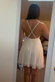 I got this for my graduation and it was perfect. It was really hot and the backless part helped keep me from overheating. It was flowy and photographed really well. Not see through at all. - Karen V.