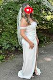 I loved the dress. It fit perfect. Very stretchy. The split and the pearls made the dress even more beautiful. Everyone complimented my dress. It was perfect for my wedding. - Stephanie C.