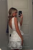 Bought this dress for graduation and received so many compliments! Found it to be a little big in the bust area, so I would order a size down and give yourself enough time in the event that you need alterations. Overall, I loved it's so cute & comfortable! Might purchase it again in navy to wear to my cousin's wedding! - Riley F.