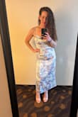 This dress is beautiful and comfortable. The slit came up a little high when seated but I don't mind that. - Samantha E.