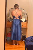 The fit is a little large in the boob area but overall fits well with double sided tape so it won't slide down. Love the pleating and reflective fabric. - Shannon M.