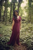 I'm obsessed with this dress! It's a little long for me but I wear it with wedges so it's not really a problem. I love how it has a tie where you can adjust it to your comfort, it helps define your waistline as well. I definitely recommend this dress! - Norman J.