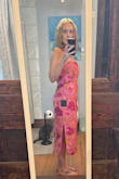 I bought this for the rehearsal dinner for my daughter's wedding. I usually wear mediums, but after reading the reviews, I decided to go with a large. It's big on me, but a medium would have been too tight. I'm bigger in the hips and butt and I did't want it super tight through that area. The chest part is too big and will have to have alterations, but for the rest of the dress, I think I'll leave it loose. - Amanda O.