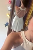 This is the best dress EVER! I have never tried on a dress that I ordered online and absolutely fell in love like I did with this one. Very flattering fit, and extremely comfortable because of the soft material. White not see through at all either! Perk, no bra needed, just pedals or something! If you're thinking about buying it, think no further - it's perfect.
For your info, I ordered a small. - Christa S.