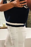 Comfortable and breathable. Hits at waistline so raising arms might reveal slight midriff. - Marie T.