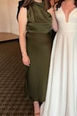 I've worn this to 2 weddings, and it is comfortable and flattering. I love the color of it, too - Lona W.