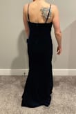 This may be the best thing I have ever put on my body. The best material, so comfy and soft. She's got some heft to her because she is velvet, but she lies so well on your body. The cowl neck is doing a lot of heavy lifting for me. - Jessica V.