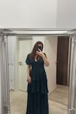 I ordered my usual size (size M) and it fits like a glove. I highly recommend this dress! - Roxana T.