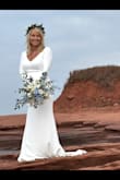 I bought this dress last minute. It arrived quickly. The material is heavy, which was perfect for my outside wedding 60 degrees. The material has a little stretch so very comfortable. The sleeves were just a little long, but I thought it looked classy. It was a tiny bit long, but I was wearing flat shoes. - Rena H.
