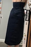 Ordered this originally in a size small but it was slightly too big, so I had it replaced with an XS. That was one was tight, but still wearable. Except the tail end of the zipper bubbled up and made it look like I had a growth protruding from the end of my spine. Sent back for a refund. - Orianna W.