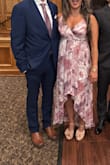 Loved the color and the high-low.  I have a smaller bust, so it was slightly baggy in the front, so I couldn't go braless.  need to get it altered, but the straps were adjustable, so it made it work. - Kim K.