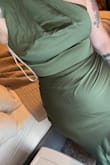 This dress is absolutely stunning. I bought it for a wedding. I'm in, and the color is gorgeous. Complements my skin tone perfectly, and it's a combination of sexy and elegant. I bought a small because I was planning on losing a little bit of weight before the wedding however, I had an issue with it being too tight on my butt and hips. I'm returning and waiting for the medium to restock, and I will purchase. - Brittney A.