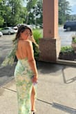 This dress was a big hit! It was slightly big/wide near my chest that I had it taken in half an inch. The fabric is delicate but it was breathable and easy to dance in. Definitely recommend! - Jessica D.