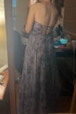 I'm loving the dress. It's made out of organza, which I love. It's a bit darker than the reference pic, but the color is cute - CINTHYA O.