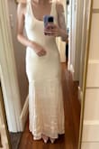 I was super excited about this dress, but unfortunately the one I received doesn't work. The top layer of the dress is way too short and doesn't meet the underlay. Like not even close. I made sure I didn't somehow have it on wrong but nope, it's just not the right length. Def gotta return. - Christy L.
