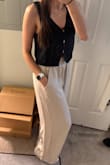 I've bought A LOT of knit tanks this summer, and this one is by far my favorite. The deep navy is stunning, and the length/fit is perfect. I would 100% recommend buying it. - Regina R.