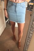 I absolutely love this skirt! It fits like a glove. It's stretchy and doesn't seem to ride up like most denim skirts. I ordered in light denim and white and I'm so glad I did!! Gonna be a summer go-to for sure. - Chelsea H.