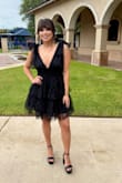 This dress was for a wedding in South Texas (read: fancy and hot AF). It did GREAT all day/night. It was so easy to put on after hair/makeup. It was so cute and looked great in photos. I felt so dressed up with minimal effort - just got a cute pair of bow earrings and black heels. I got a ton of compliments at the wedding and from friends and family from pictures! The small black beads on the dress give it movement, but a few of them did fall off. It didn't bother me at all because there's tons of them all over. I definitely recommend this dress for a special event. - Daniela D.