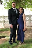 I am 30 weeks pregnant and have been looking for a dress for a fancy work party. I am too cheap to spend a lot on something I'll only wear once and when I came across this dress I knew it was perfect, pre and post pregnancy. After reading reviews, I decided to go with my regular size (small, 125 lbs not pregnant) and hoped it was stretchy enough for my belly. It fit great! A medium probably would have been longer but I wanted to be able to wear it when I'm not pregnant too. It's a beautiful dress. The material is soft and comfortable and the navy blue color was so pretty. This dress has a lot of material and is very forgiving. I absolutely love it! - Kerri T.